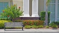 Empty Bench on a Sidewalk Royalty Free Stock Photo