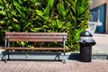 Empty Bench on a Stone Pavement