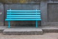 Empty bench in the street outside. Urban background. Rest and relaxation Royalty Free Stock Photo