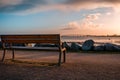 Empty bench at sunrise with the bridge of Ile de Re in the background. tranquility concept