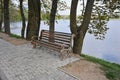 Empty bench by the water Royalty Free Stock Photo