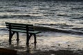 Empty Bench On Windy Seaside