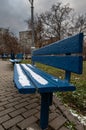 empty benches in the city autumn square