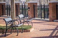 Empty benches in a city park in spring Royalty Free Stock Photo