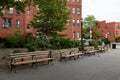 Empty Benches at Coffey Park in Red Hook Brooklyn during Spring Royalty Free Stock Photo