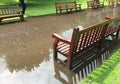 Benches in the park after rain in summer time, Edinburgh, Scotland Royalty Free Stock Photo