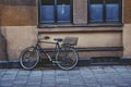 empty bicycle parked on footpath