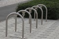 Empty bicycle parking metal rack near the road Royalty Free Stock Photo