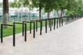 Empty bicycle parking racks in park Royalty Free Stock Photo