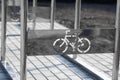 Empty bicycle parking with a sign of bicycle on a street. Royalty Free Stock Photo