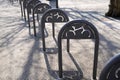 Empty bike parking in city park space for multiple bikes bicycles in environmentally friendly urban transport in town