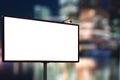 Empty billboard mock up against night business city center background Royalty Free Stock Photo