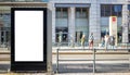 Empty billboard for public advertisement at the bus stop. Space for text. People and city background Royalty Free Stock Photo