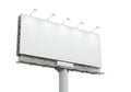 Empty billboard standing against a plain white background awaiting advertisement Royalty Free Stock Photo