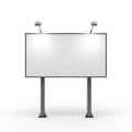 Empty billboard standing on a flat surface with two spotlights on top Royalty Free Stock Photo