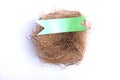 Empty bird nest with colorful ribbon Royalty Free Stock Photo