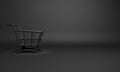 Empty black basket trolley cart in the studio lighting.