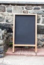 Empty black board with copy space for advertising. Blank dark board with empty space for text. Advertising concept image