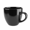 An empty black ceramic mug standing on a surface, with a glossy glaze Royalty Free Stock Photo