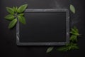 Empty black chalkboard in graphite marble frame with mint for menu and advertising, Generative AI Royalty Free Stock Photo