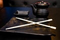 Empty black clear set for sushi,plate with Japanese chopstick,saucer on the black table Royalty Free Stock Photo