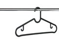 Empty black coat hanger / clothes hanger on a clothes rail