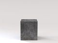 Empty black concrete podium on white background. 3D rendering.