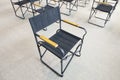 Empty black folding chairs Royalty Free Stock Photo