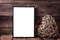 Empty black frame and decorative heart with twinkle light on Royalty Free Stock Photo