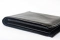Empty black leather wallet on a white background Royalty Free Stock Photo