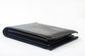 Empty black leather wallet on a white background Royalty Free Stock Photo