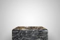 Empty black marble podium on white background. Best for product presentation. 3d rendered cube pedestal.