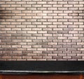 Empty black marble table and white brick wall in background. pro Royalty Free Stock Photo