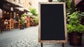 Empty Black Menu board mockup near restaurant Royalty Free Stock Photo