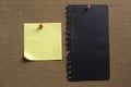 An empty black paper and memo note on notice cork board. Copy space for text, logo Royalty Free Stock Photo