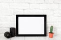 Empty black photo frame on wooden shelf or table. Mockup with copy space Royalty Free Stock Photo