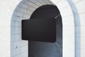 Empty black rectangular poster hanging on  building facade arch. Advertisement, commercial and shop concept. 3D Rendering Royalty Free Stock Photo