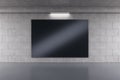 Empty black screen banner with reflections in concrete tile urban underground interior. Advertisement and commercial concept. Mock