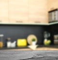 Empty black stone table in modern kitchen Royalty Free Stock Photo