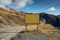 Empty blank billboard mockup, near asphalting road in mountains of Transfagarasan Royalty Free Stock Photo