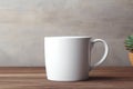Empty blank mock up of white ceramic coffee mug on wooden table Royalty Free Stock Photo