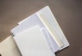 blank sheets notebook sketchbook on gray background