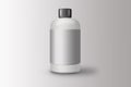 Empty blank white Matte Plastic Bottle with Cap, Isolated on a grey background. Royalty Free Stock Photo