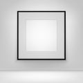 Empty Blank White Mock Up Poster Picture Black Frame on Wall with Floor Front View Royalty Free Stock Photo