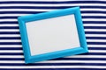 Empty blue frame on a vest background, top view