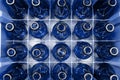 Empty blue glass beer bottles in the box Royalty Free Stock Photo