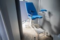 Empty blue gynecological chair in the gynecologist's office. Royalty Free Stock Photo