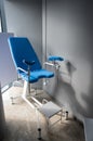 Empty blue gynecological chair in the gynecologist's office. Royalty Free Stock Photo