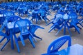 empty blue plastic chairs and tables outside, preparing for the holiday, no people Royalty Free Stock Photo