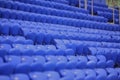 The empty blue plastic seat at stadium